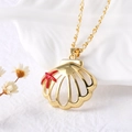 Golden shell necklace featuring a red starfish detail on a refined metal chain - Style B / Gold Hollow Shell + Red Starfish