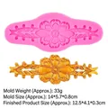 Pink silicone mold featuring relief flower vines with golden floral fondant finished part - Long Strip Relief Floral (B598) / Pink