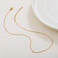 Elegant gold titanium steel thin O-chain necklace with lobster clasp and extension - Double-Ended Cross Chain