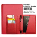 Red saffiano leather passport cover with multiple card slots and a pen holder - Red