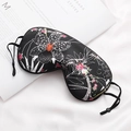 Black silk sleep mask featuring white orchid floral print and adjustable elastic strap - Ethnic Style-Black Orchid