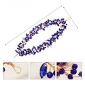 Detalle de diadema de doble capa con cristales azules y hojas doradas de pedrería artesanal - Hoja Dorada / Cristal Azul / Azul