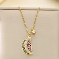 Detail of gold necklace with a crystal-encrusted watermelon slice pendant on a display - Zirconia Half-Round Watermelon Style (KN292060-Z)