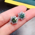 Snowflake emerald stud earrings with green moissanite and halo diamond accents - Blue Green Moissanite Style Studs