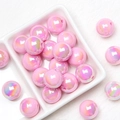 Macro shot of 16mm pink iridescent acrylic round beads for DIY jewelry and crafts - Light Pink