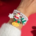 Beaded Christmas bracelet with Santa, reindeer and tree charms on a festive red background - White Faux Pearl Style(28443-white)