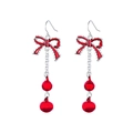 Close-up of Christmas earrings with red bows and double spheres on silver hooks - Long Red Bow and Double Bell