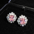 Detailed macro view of pink rectangular crystal stud earrings in a black velvet box - Pink Zirconia Stud Earrings [Pair Price]