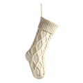 Classic cream white knitted Christmas stocking with diamond cable knit pattern on white background - Ivory