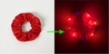 Red satin LED hair scrunchie shown in normal light and glowing in the dark - Lighted-Red