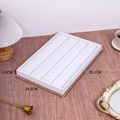 Detailed view of white jewelry display tray with dimensions 35.1cm x 24.3cm x 2.9cm - 35*24 Tray 4 Tiers