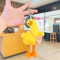 Cute yellow plush duck keychain with denim hat and brown crossbody bag accessory - Plush Crooked Neck Backpack Duck / Yellow