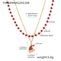 Detail showing two-layer Christmas hat necklace with red garnet beads and gold steel chain - Golden Double Layer Christmas Hat Necklace (TXP184)
