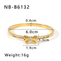 Dettaglio del bracciale a fiocco placcato oro 18K con zircone a cuore e misure - Stile Fiocco con Gemma a Cuore (NB-B6132) / Oro 18K