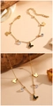 Bracciale a farfalla dorato con ciondoli neri e cristalli scintillanti su catena a maglie - Set di Gioielli Farfalla con Conchiglia Nera / Oro