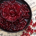 Translucent red bamboo-shaped glass beads for DIY jewelry with a central drill hole - Transparent Red (6x12mm)