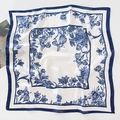 Flat lay of square silk scarf with blue floral and insect print on white background - 70*70cm / Sketch Floral - Navy Blue
