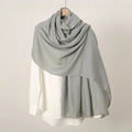 Solid grey linen-touch scarf for women elegantly displayed on a white hanger - Light Grey