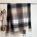 Detail of plaid cashmere scarf with tassels, neutral check pattern on metal rack - 195x67cm / Gray White Gray