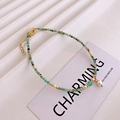 Detailed close-up of Amazonite beads and pearl anklet with gold adjustable chain - Anklet / Blue