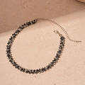 Elegante schwarz-weiße Kristall-Halskette mit versilberter Kette und Verlängerung - Silber-Schwarz Gespleißter Stil