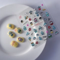 5D embossed cartoon fish monster nail stickers with 3D texture on yellow almond nails - Feb-480