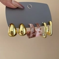 Close-up of gold chunky C-shape earrings and acrylic marble hoop earrings set on grey card - 10# Silver Pin (6-Piece Set) / Gold
