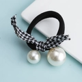 Detail of elastic hair tie with houndstooth bow and hanging white faux pearls - Houndstooth Bow with 2 Pearls