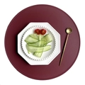 Faux leather floral placemat in burgundy red with hexagon ceramic plate and gold spoon - Pressed Edge Faux Leather Round / Red