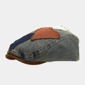 Side view of a vintage washed denim beret featuring hand-stitched heart patches. - Heart Patchwork Style (Color 3)