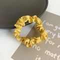 Elastic satin scrunchie in bright yellow silk fabric with soft pleated texture - Yellow Solid