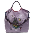 Purple canvas tote bag featuring cartoon black rabbit and moon stars graphics - Purple