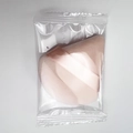 Pink triangular velvet makeup puff with satin ribbon for smooth powder application - Nude / Single Bagged