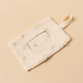 Close-up of cotton baby bed hanging bag with green leaf pattern and snap strap details - Green Branch Leaves
