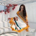 Ethnic style large orange scarf with abstract horse print worn as a light summer shawl - Yellow Border Carriage