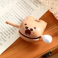 Brown cartoon bear desk bell with a glossy finish on vintage book and lace background - Brown Ornament Cool