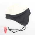 Detalle de gorro cortavientos con orejeras, forro térmico y correa ajustable - Adulto Negro Blanco Patchwork (D)