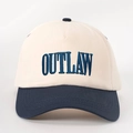 Detail of high-density twill cotton baseball cap with OUTLAW embroidery and contrast brim - Adjustable / Beige and Navy