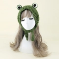 Cute green hand-knitted frog beanie with big 3D eyes and ear flaps for winter warmth - One Size / Green