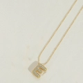 Letter E gold pendant necklace with sparkling micro-pave cubic zirconia crystals - Letter E
