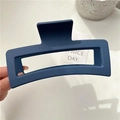 Matte navy blue rectangular hair claw clip with hollow design held by hand - Matte Square Blue-13cm