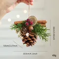 Handmade Christmas ornament with natural pinecones, cinnamon sticks, and berries - Pine Cone Pendant