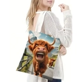 Close-up of a white canvas tote bag featuring a funny 3D cartoon highland cow printed pattern - Cartoon Highland Cow Print