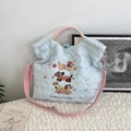 Light blue quilted tote bag with cute dog embroidery and pink canvas shoulder straps - Skateboard Dog Blue