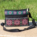 Ethnic crossbody bag with cross stitch embroidery and double zippers on a stone stand - Style 3