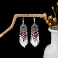 Bohemian silver earrings with red beads and fringe pendants on a rustic branch - Retro Silver + Red Beads Metal Plate (E5223-1)