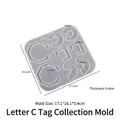 Silicone resin mold for water drop pendants with 17.1x16.1cm dimensions and 0.4cm thickness - C-Shape Tag Mold / Translucent Grey
