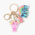 Detailed view of gold MOM keychain with rainbow acrylic charm, floral tag and pink tassel - Blue Rainbow MOM Style