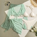 Flat lay of a 4-piece lace bikini set with green floral cover-up and resort accessories - S / Emerald Green