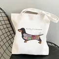 White canvas tote bag featuring humorous cartoon Dachshund anatomy print on front - C8 / No Inner Pocket No Zipper